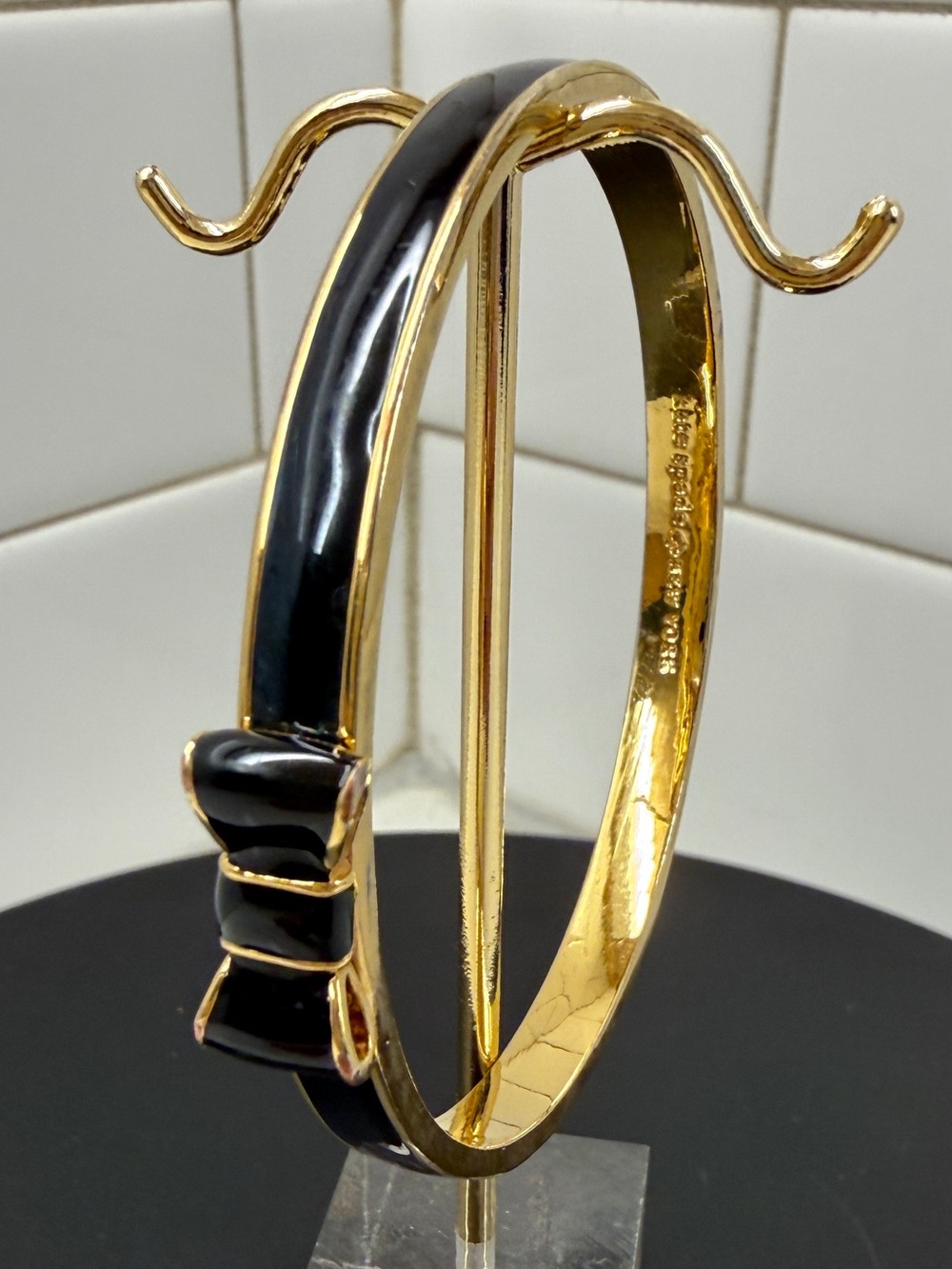 kate spade Gold-Tone Bracelet with Black Enamel Bow